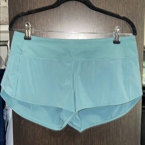 Lululemon 2.5” low rise speed up shorts in teal